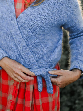 detail of hand knit wrap cardigan