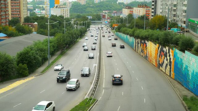 Top view to street road full with traffic cars and buses transportation in day time.
