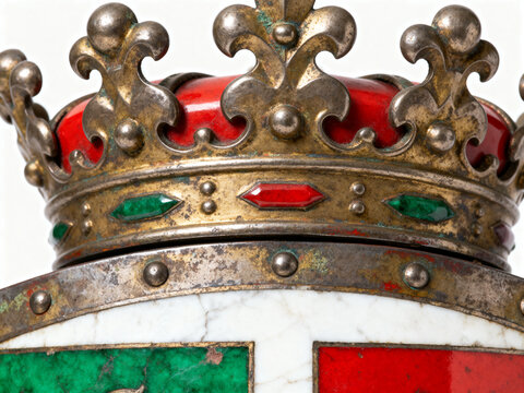 Ornate golden medieval crown featuring polished red velvet and sparkling green gems on white background