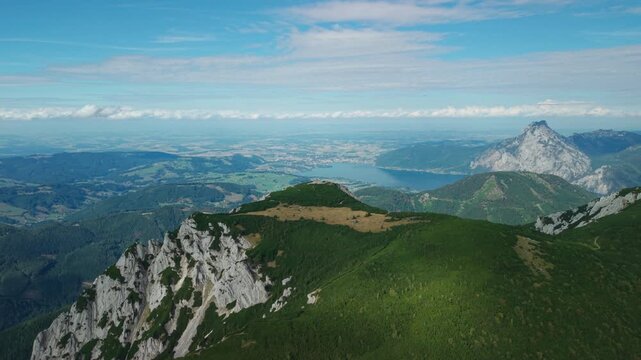 Aerial view of Alberfeldkogel peak with Traunsee lake and Traunstein mountain