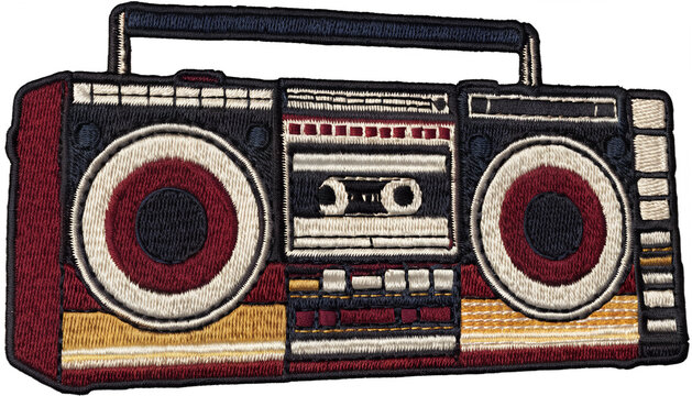 Vintage embroidered retro boombox patch, classic 1980s portable stereo with two large speakers, cassette deck and chunky control buttons, detailed layered thread embroidery, textured woven fabric