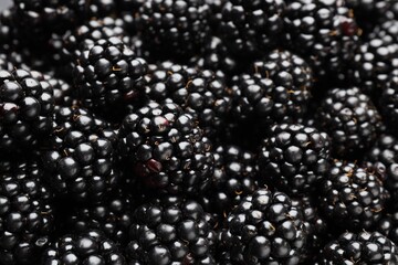 Heap of ripe tasty blackberries as background, closeup © New Africa