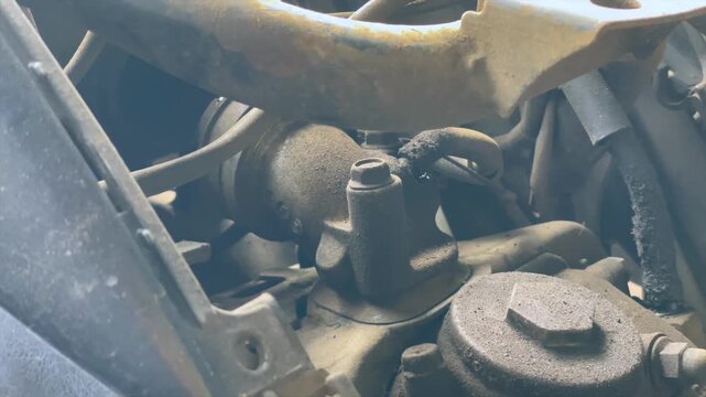 Motorcycle engine internal components and mechanical parts closeup in workshop