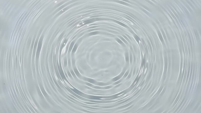 Water ripple effect concentric circles pattern background with calm liquid surface and soft light reflection