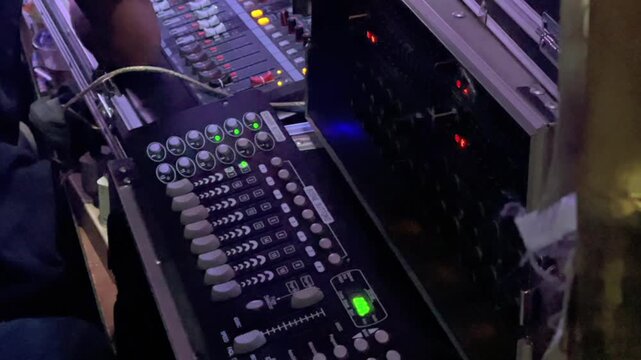 Audio mixing console and sound system control panel in production studio