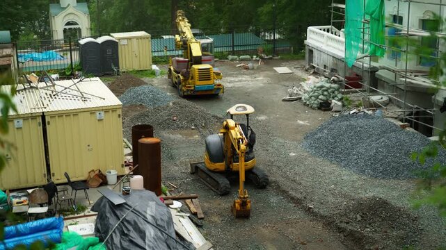 Crawler excavator during earthmoving works on construction site