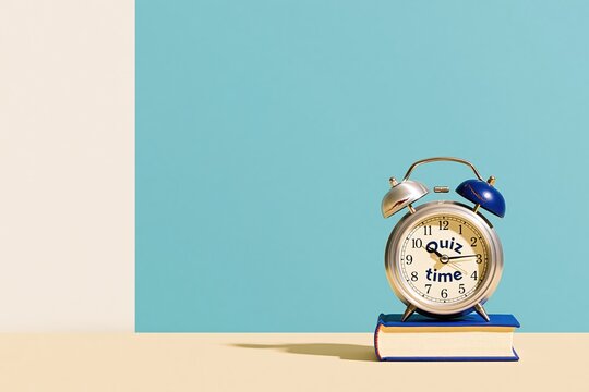 Twin-bell alarm clock with quiz time text on a hardback book, featuring brushed metal and glass textures for education and exam preparation, with copy space