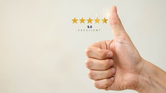 A person gives a thumbs up gesture with five stars and excellent rating hologram. This represents customer satisfaction and positive business feedback concept.