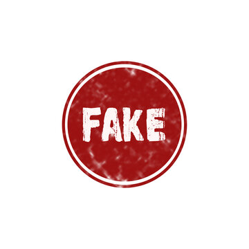 A red round rubber stamp with the word fake written in white bold capital letters for document verification