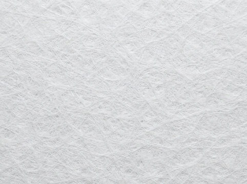 Minimalist white tyvek paper background texture with abstract synthetic fiber pattern, clean blank nonwoven material sheet close up, elegant light gray luxury design mockup with copy space