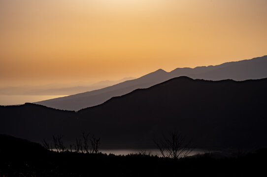 Looking out over the mountains around Lake Ashi at sunset in Hakone, Japan.