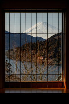 View of Mount Fuji over Lake Ashi through a window in Hakone, Japan.