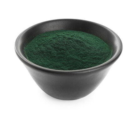 Spirulina powder in bowl isolated on white
