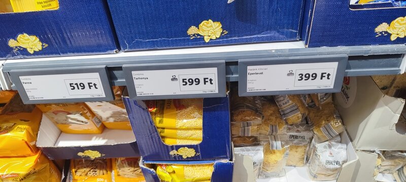 Budapest, Hungary - 26 June 2024, Store shelves in Budapest show prices for different pasta packages during a shopping trip