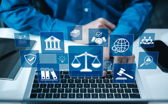 Legal Professional with Justice Icons. Legal professional using laptop with virtual icons symbolizing law, justice, and legal services. business legislation, Notary public, legal advice online, Lawyer