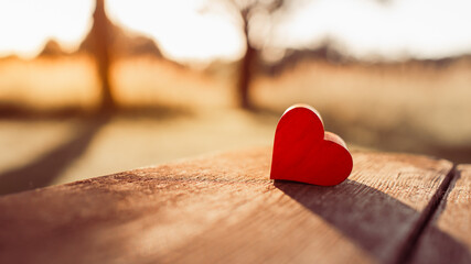 Red Heart in Golden Sunlight Symbolizing Love, Romance and Affection
