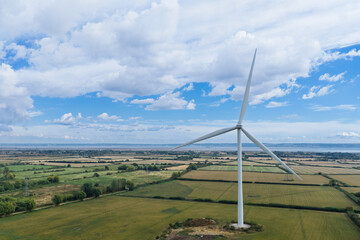 Wind Turbine in a Sunny Severn Estuary Field © Tom