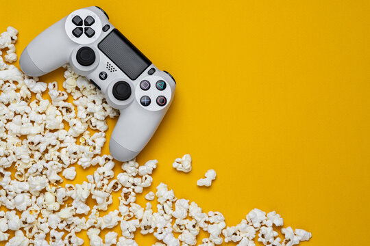 September 2, 2026, Odessa, Ukraine.  White Sony DualShock controller with popcorn
