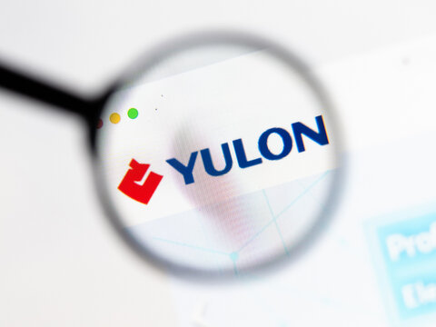 Milan, Italy 2026, 15 AGO Closeup of Yulon Motor website page on a laptop screen. Focus on Yulon Motor logo under a magnifying glass.