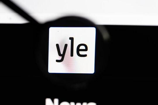 Milan, Italy 2026, 15 AGO Closeup of Yle News Finland website page on a laptop screen. Focus on Yle News Finland logo under a magnifying glass.