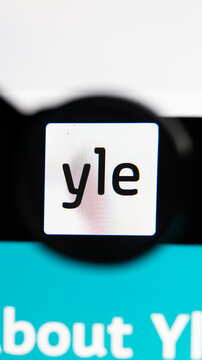 Milan, Italy 2026, 15 AGO Closeup of Yle News Finland website page on a laptop screen. Focus on Yle News Finland logo under a magnifying glass.