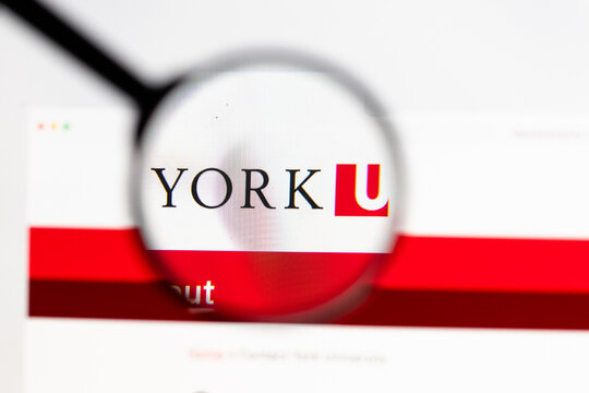 Milan, Italy 2026, 15 AGO Closeup of York University Canada website page on a laptop screen. Focus on York University Canada logo under a magnifying glass.