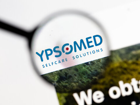 Milan, Italy 2026, 15 AGO Closeup of Ypsomed website page on a laptop screen. Focus on Ypsomed logo under a magnifying glass.