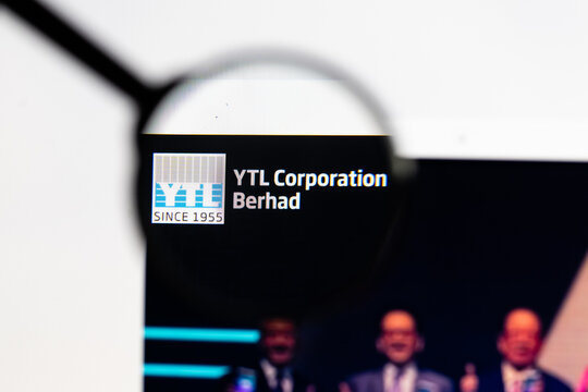 Milan, Italy 2026, 15 AGO Closeup of YTL Corporation website page on a laptop screen. Focus on YTL Corporation logo under a magnifying glass.