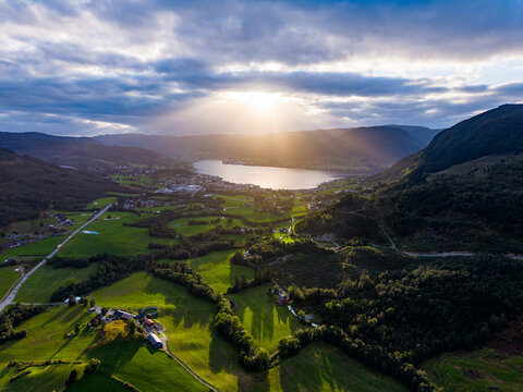 Aerial View of Norwegian Valley and Farmland at Sunset