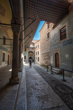 Istanbul,turkey,august 3, 2025. Tourist walking along the historic harem courtyard, featuring intricate ottoman tiles and traditional architecture in istanbul, turkey
