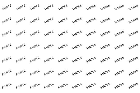 Repeating pattern of black sample text stamps on a flat surface