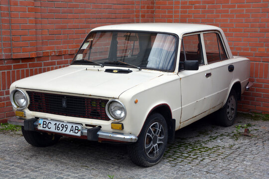 KIEV UKRAINE: Old Lada car on the road. LADA is a brand of cars manufactured by the Russian car manufacturer AvtoVAZ based in Tolyatti, Samara Oblast.