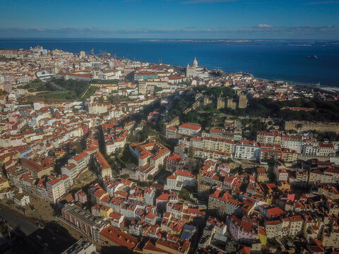Aerial Panorama of Lisbon Cityscape with S&atilde;o Jorge Castle and Tagus River