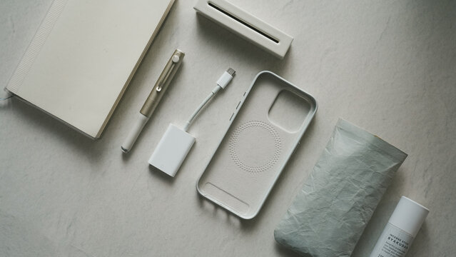 Tech Accessories Flat Lay with Notebook and Charger