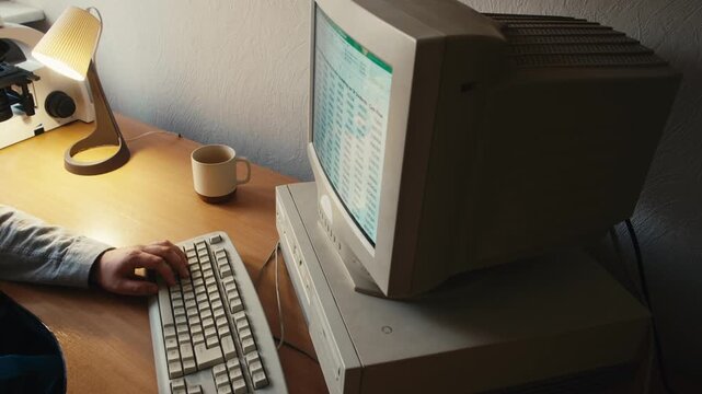 Retro pc computer gaming, Desktop vintage with loading code console, programmer making scripts, green basic screen, Old computer studio close-up, retro wave display, late 90s PC.