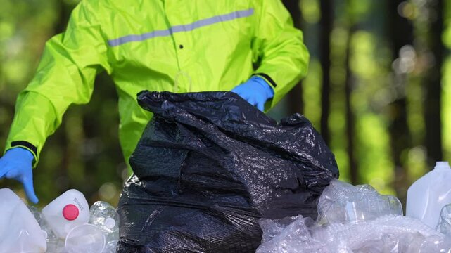 Garbage trash disposal helps restore ecosystems. Plastic trash collection makes a difference. Rubbish trash cleanup concept. Volunteers and trash waste recycling reduces pollution.
