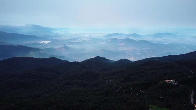 Aerial Drone View Over Ba Na Hills at Dusk, Da Nang Vietnam &ndash; Misty Mountain Ridges, Cable Cars and Expansive Highland Valley
