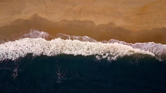 Aerial View of Powerful Waves Breaking Along Da Nang Beach, Vietnam
