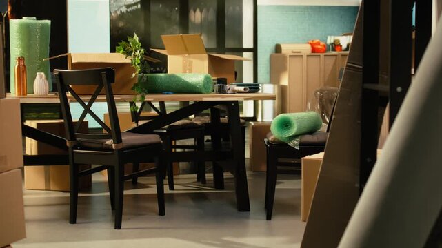 Empty home interior with stacked cardboard boxes after relocation