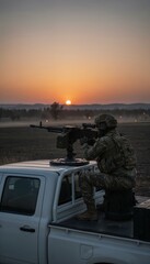 Obraz premium Soldier Operating Weapon on Military Vehicle During Sunset in a Field for Defense and Security Concept
