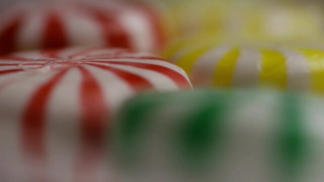 Macro rack focus shot of colorful peppermint hard candies
