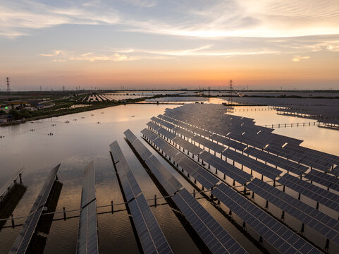 Solar photovoltaic panels on the water in the evening