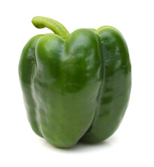Green bell pepper in a bowl on white background