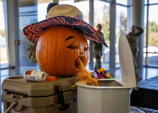 scarecrow and pumpkins