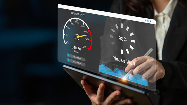 A business professional uses a tablet to check internet speed, highlighting performance with a loading screen and a speedometer in a sleek, modern office setting. Ledger