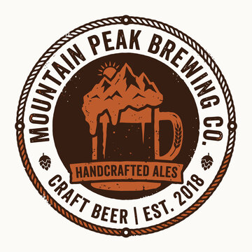 Mountain peak brewing craft beer logo with a beer mug and mountains for handcrafted ales