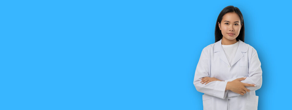 Woman in white coat poses for a blank design backdrop