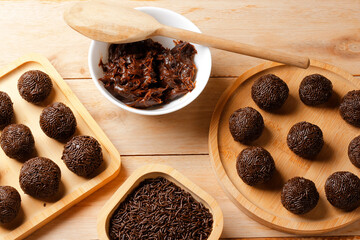 Brigadeiro a traditional Brazilian dessert made with chocolate and coated in sprinkles.