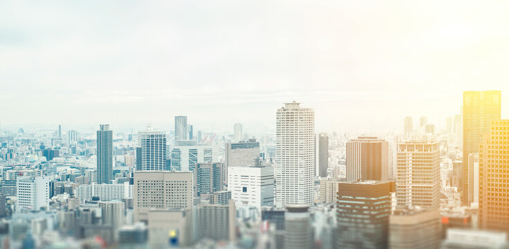 Aerial view of osaka city skyline with skyscrapers and blurred foreground in Japan, tilt shift effect