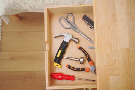 Tools in a wooden drawer for projects
